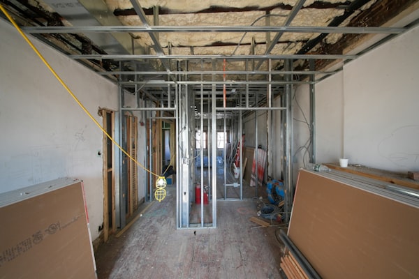 Interior construction with metal framing and drywall panels